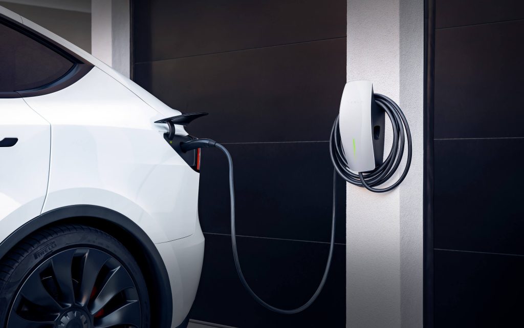 tesla wall connector ev charger charging vehicle